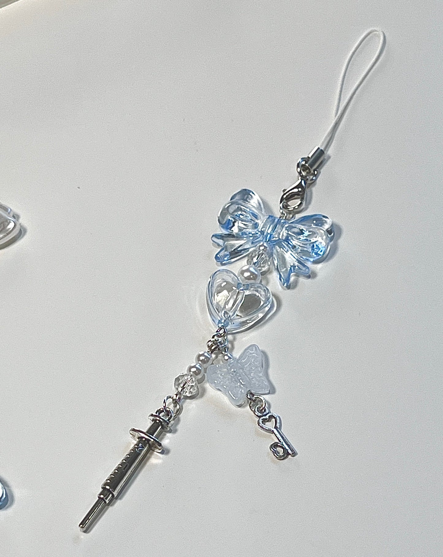 Spinning Heart • Needle Phone Charm - blue